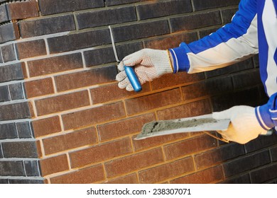 Construction Process Of Bricklaying Using The Brick Jointer Trowel