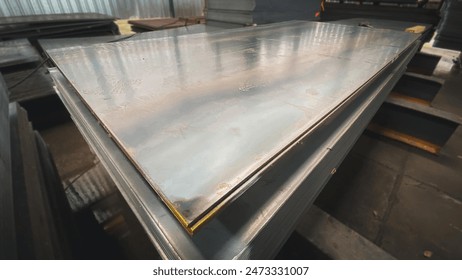 construction products Background concept or introduction of steel products Square metal pipe piles, steel gutters, angle iron,Channel Steel.thick hot rolled steel sheets stack corner, close-up - Powered by Shutterstock