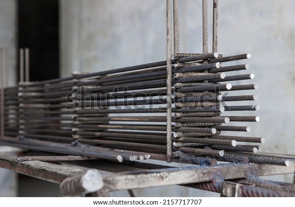 Construction rebar\
steel work reinforcement. Reinforcements steel bars stack. Close up\
steel construction\
rebar