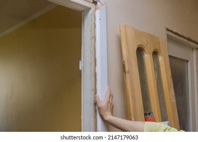 Construction Redevelopment Work With Dismantled Old Interior Door Molding In Apartment