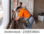 Construction or renovation of apartments.  Home renovation workers crew. Builders apartment improvement or restoration works.