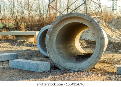 Construction of sewers with large concrete pipes on the background of building products