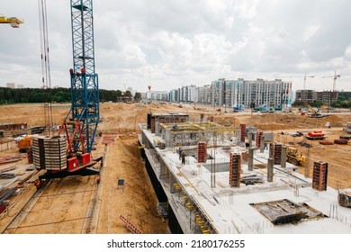 Construction site background. Hoisting cranes and new multi-storey buildings . High quality photo - Shutterstock ID 2180176255