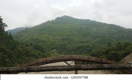 Construction Site Of A Bridge On A Main Road In Nepal, Unsafe Working Environment In The Himalayas On The Highway Between Kathmandu And Pokhara