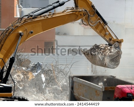 Construction Site Clearance: Excavator with Debris and Truck