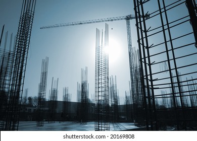 Construction site with enforced concrete steel frames rising up - Shutterstock ID 20169808