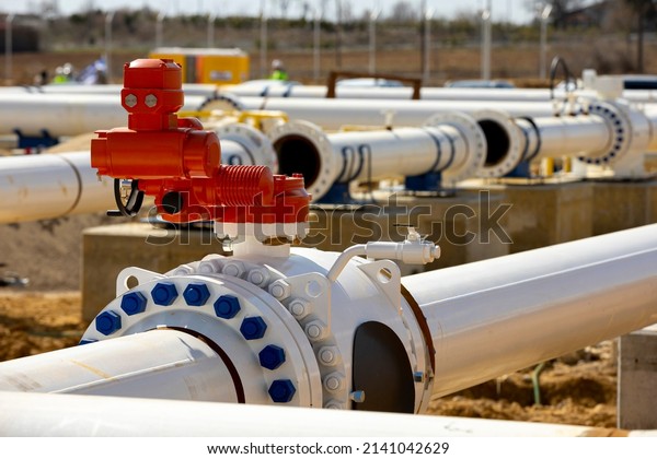 Construction site of an interconnected natural gas\
transmission pipeline. Highly integrated network that moves natural\
gas. Connection point between the transmission company and the\
receiving party.