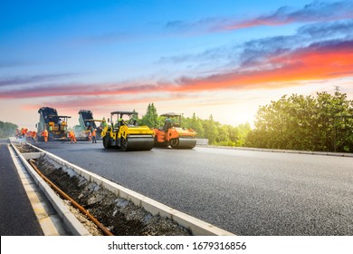 Construction site is laying new asphalt road pavement road construction workers   road construction machinery scene highway construction site landscape 