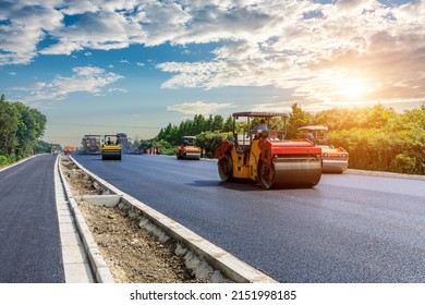 Construction site is laying new asphalt pavement  road construction workers   road construction machinery scene  Highway construction site scene 