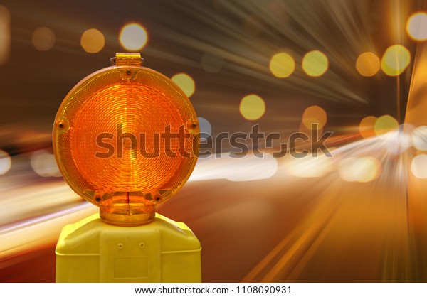 Construction site\
lock with signal lamp on a\
road