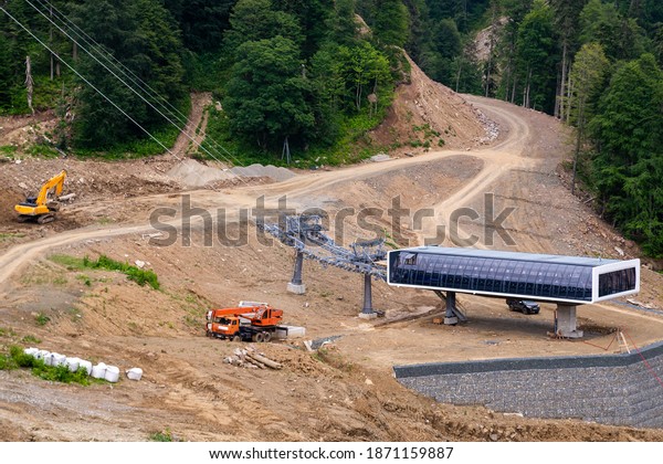 Construction site in a mountainous\
area. Construction of the cable car station of the ski\
resort