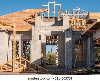 Construction Site Of New Single-family Suburban House In Morning Sunlight And Shadow On A Sunny Day In Southwest Florida