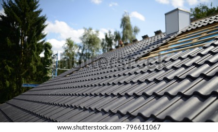 construction site roofing black tiles