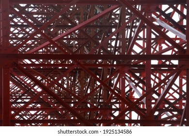 The Construction Site Steel Frame From A Strange Perspective. Red Steel Frame In Construction Work.