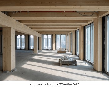 construction site of a Timber-concrete composite office building  - Powered by Shutterstock