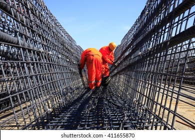 In The Construction Site, The Welding Workers At Work