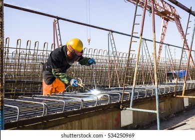 In the construction site, the welding workers at work - Shutterstock ID 534250969