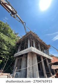 Construction site worker processing installation of building on site project at Denpasar, Bali.