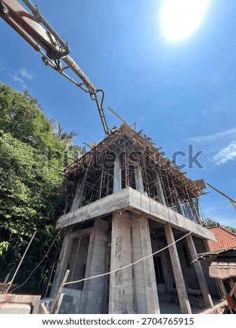Construction site worker processing installation of building on site project at Denpasar, Bali.