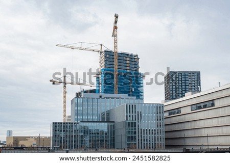 Construction of skyscrapers near central station in downtown Utrecht, The Netherlands