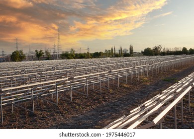 Construction Of A Solar Farm, Sunset. Industry