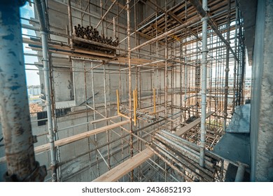 Construction of a steelframed building with scaffolding in progress