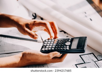Construction and structure concept of Engineer or architect meeting for project working with partner and engineering tools on model building and blueprint in working site, contract for both companies.