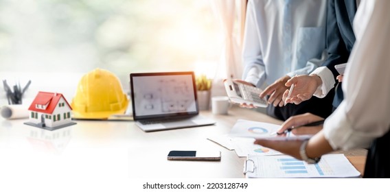 Construction and structure concept of engineer working meeting for project working with partner in working site, construction concept  - Shutterstock ID 2203128749