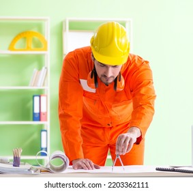Construction supervisor planning new project in office