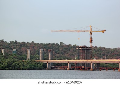 Construction Of Tall Concrete Piers Using Tower Crane For New Bridge Across Mandovi River In Goa, India