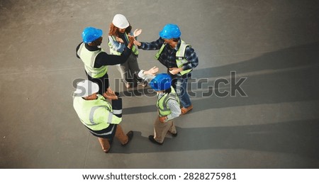 Construction, team and unity with high five in meeting or above for success, winning or mission. Top view, architect or group of contractors with touch or celebration for completion or done on space