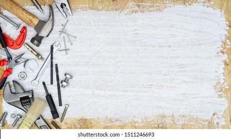 Construction Tools DIY Background Concept. Tools Shop Service Banner. Set Of Tools Supplies For House Repair Builder On White Painted Wood Background.