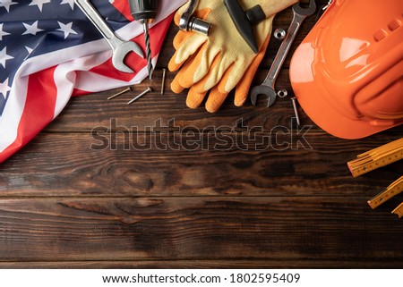 Construction tools on table, space for text
