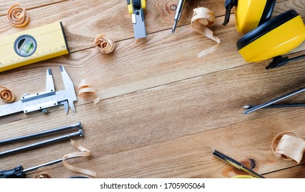 Construction Tools On A Wooden Table. Construction Concept. Work Tools On Wooden Boards.

