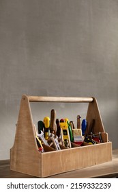 Construction Tools And Toolbox On Wooden Table Background Texture. Tools Kit And Tool Box