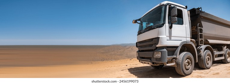 Construction work in the mountains, while the truck is working. stock photo