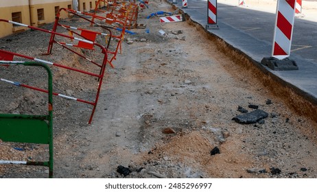 Construction work, road repair, road surface, asphalt, restoration, beautification, urban environment, urbanism, signs, fences, no access, traffic restrictions, blocking, Europe, France, summer