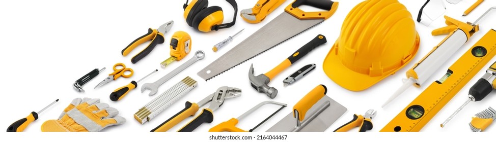 Construction work tools for building. Yellow hard hat with work equipment isolated on white background. Layout for home service repair concept or hardware store showcase banner.Top view set of objects - Shutterstock ID 2164044467