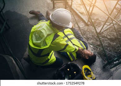 Construction Worker Accident, Accidents At Work, Builder Accident Fall Scaffolding To The Floor, Safety Team Help Employee Accident, Basic First Aid Training For Support Accident In Site Work.