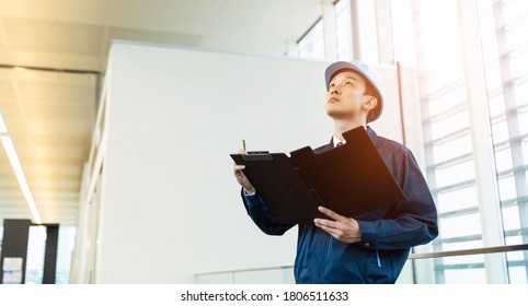 Construction Worker In The Building. Maintenance And Inspection.