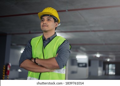 Construction Worker At Building Site. Portrait Of Contruction Worker.