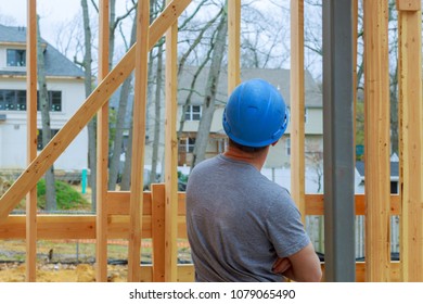 Construction Worker Building Timber Frame New Home