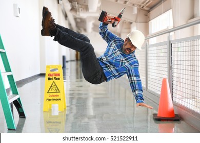 Construction worker falling off a ladder inside a building