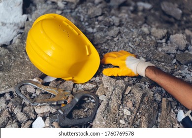 Construction Worker Has An Accident While Working On New House. Construction Worker Lies On The Floor At The Work Site. Work Accident