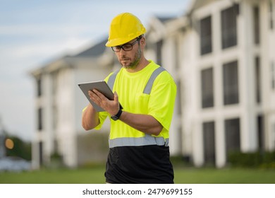 A construction worker in highvisibility gear emphasizes safety and professionalism at a dusty work site