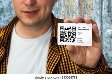 Construction Worker Holding A QR Code Business Card, Business Introduction Concept.