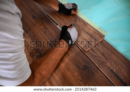 Similar – Image, Stock Photo Installing new laminate wood flooring in the house
