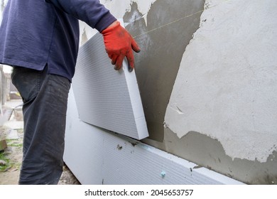 Construction Worker Installing Styrofoam Insulation Sheets Stock Photo ...