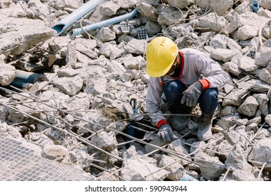 Construction Worker Keep Concrete Debris Leaving In Construction Area.