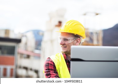 Construction Worker With Laptop